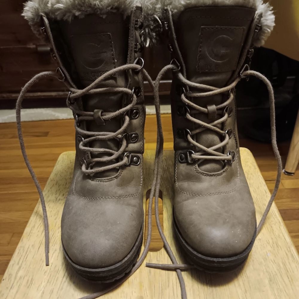 G BY GUESS  Tan lace up boots with heels and fur inside boot and trim